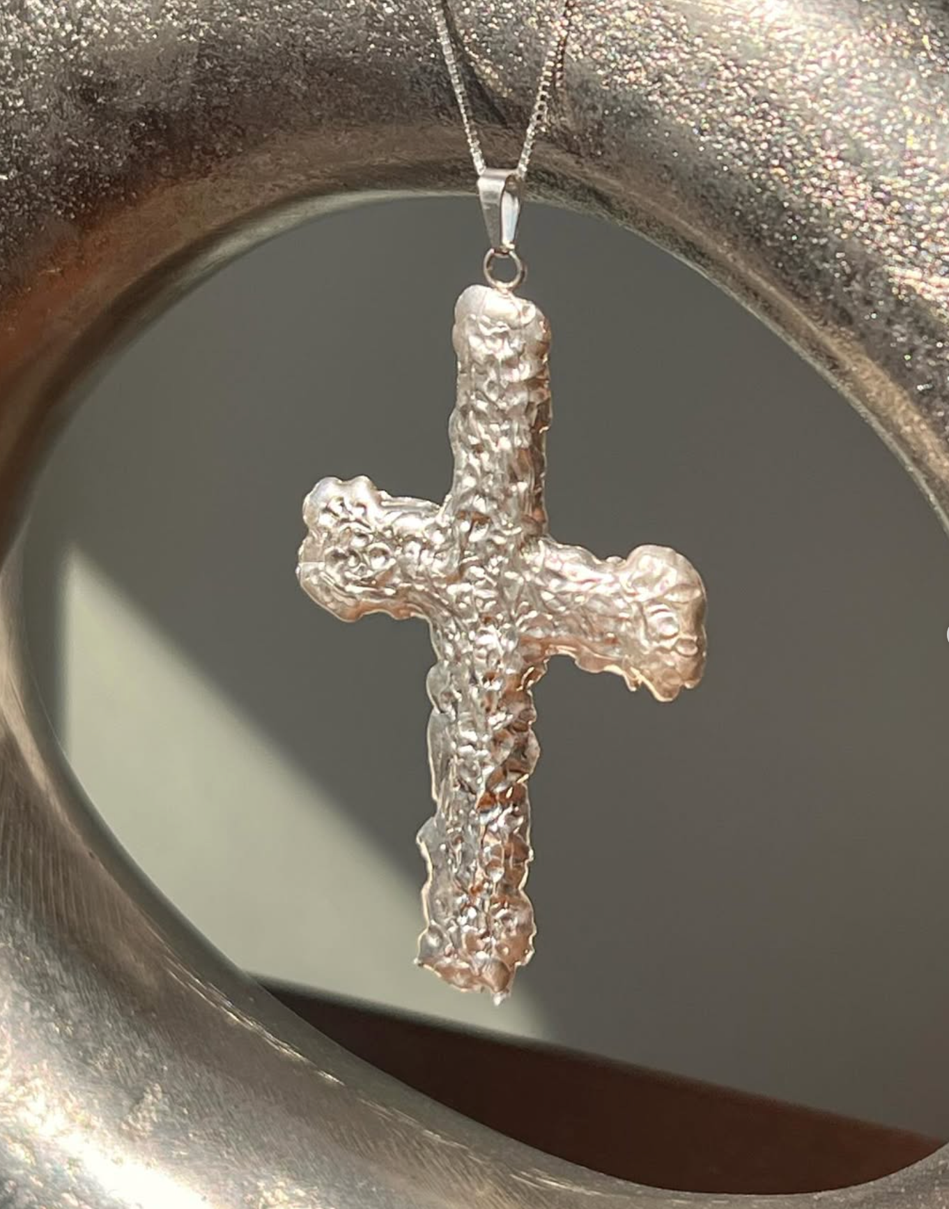 Crucifixo Derretido